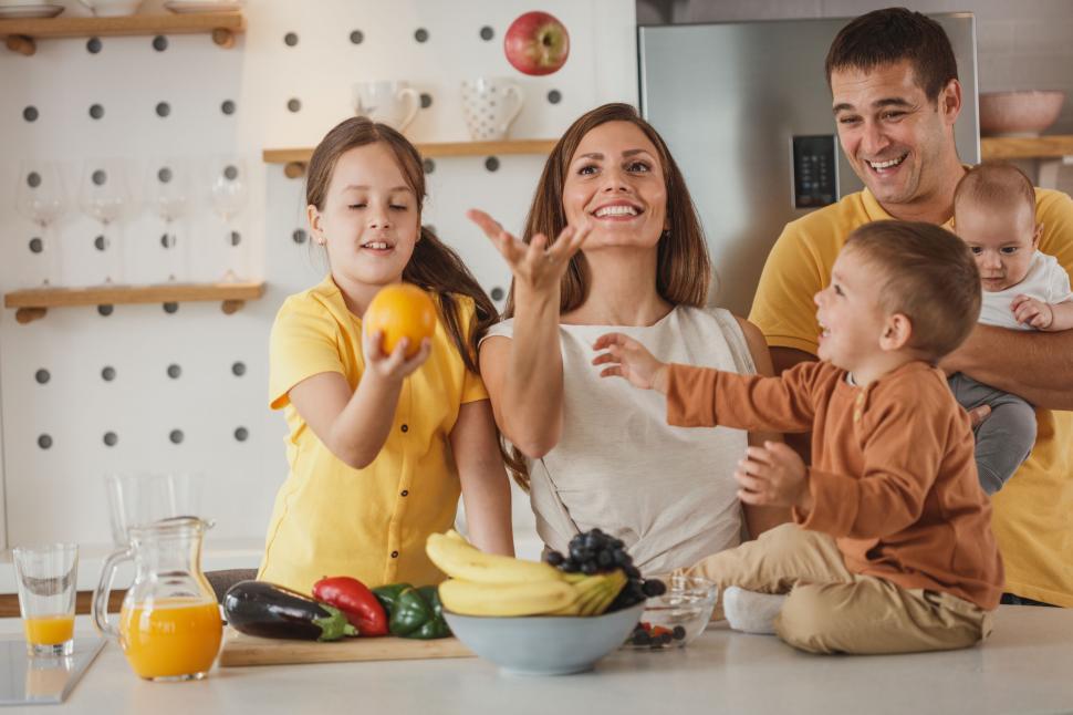 family-enjoying-time-together-in-the-kitchen